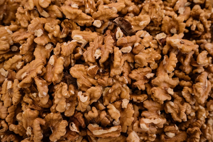 Free Photo organic walnuts background