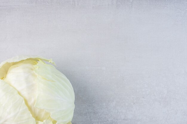 Organic white cabbage on stone surface. High quality photo