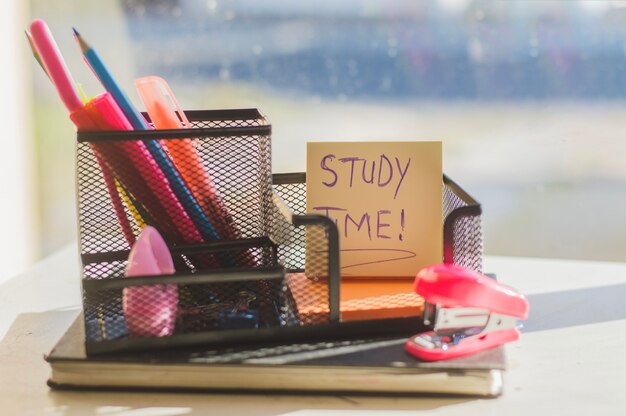 Organizer with notebook on window sill