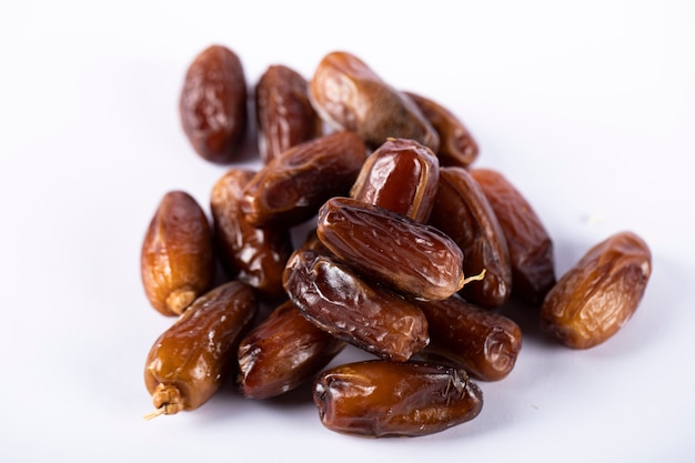 Oriental dates isolated on white table