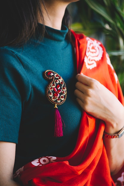 Oriental style pin with stones on it. High quality photo