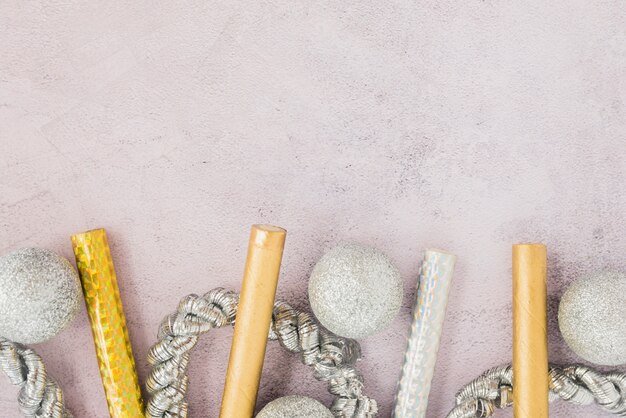 Ornament wands near baubles and tinsel 