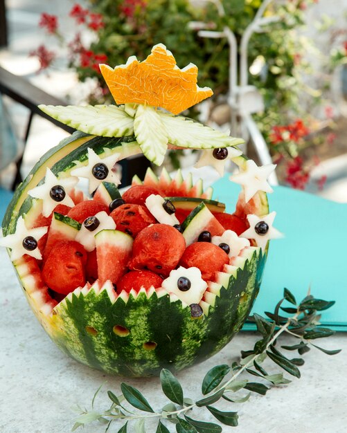 Ornated watermelon basket with watermelons pieces