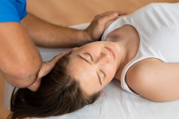 osteopathy patient getting treatment massage