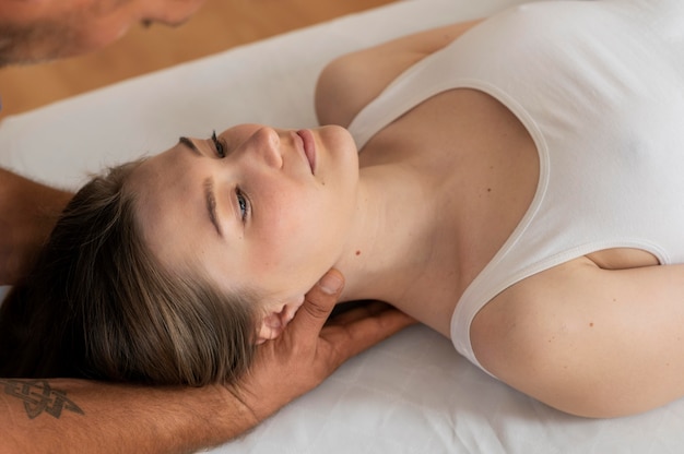 Osteopathy patient getting treatment massage