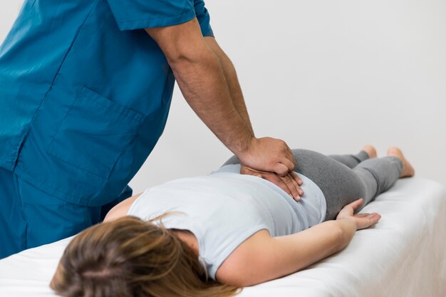 Osteopathy patient getting treatment massage