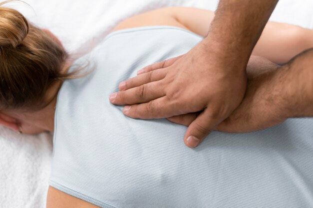 Osteopathy patient getting treatment massage