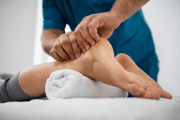 Free photo osteopathy patient getting treatment massage