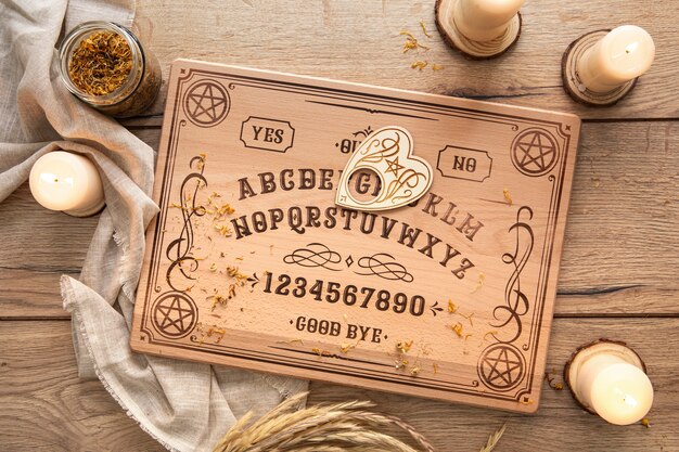 Ouija board and candles arrangement