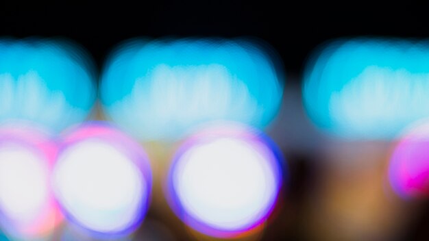 Out-of-focus colorful bokeh neon lights