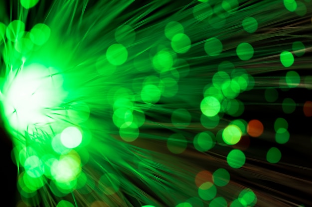 Out of focus green fiber optics light