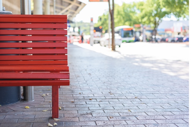 Outdoor red wooden benches