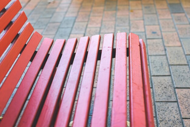 Outdoor red wooden benches