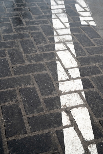 Outdoors cobblestone texture with paint lines