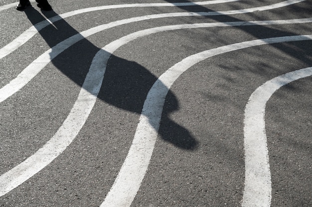 Outdoors cobblestone texture with wavy lines and shadows