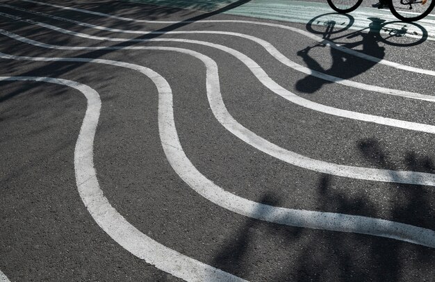 Outdoors cobblestone texture with wavy lines and shadows