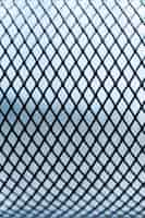 Free photo outdoors metallic fence background