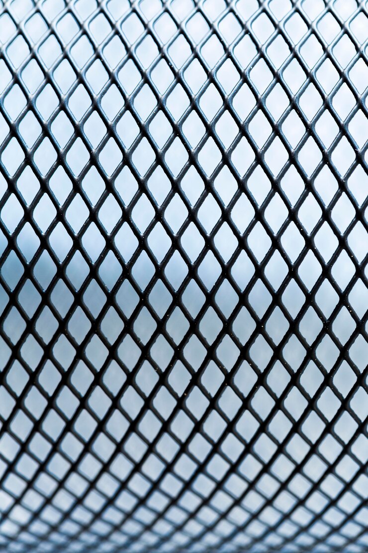 Free Photo outdoors metallic fence background
