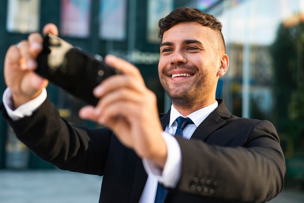 Free photo outdoors successful business person