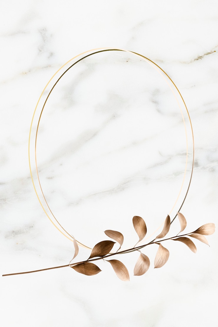 Free Photo oval golden frame on a marble background