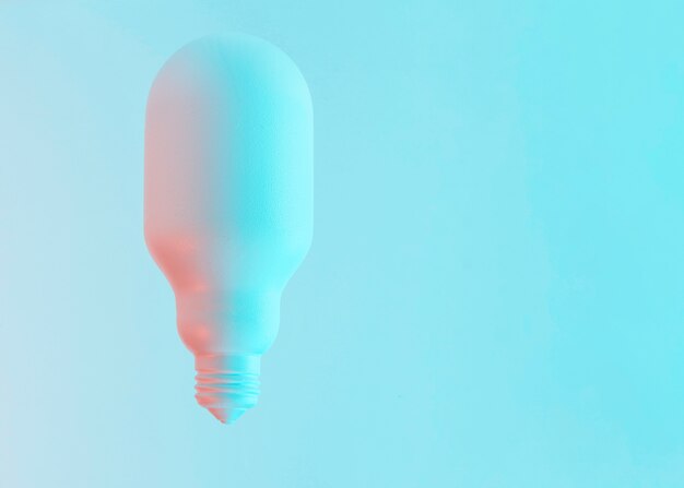 Лампа овальной формы белого цвета на синем фоне