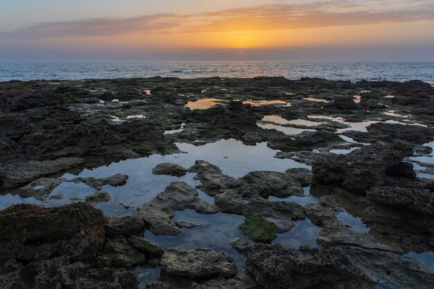 Overhead shot of rocks in the seashore of zahora spain