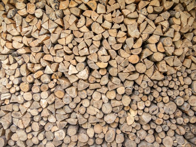 Overhead shot of small pieces of cut wood stacked next to each other