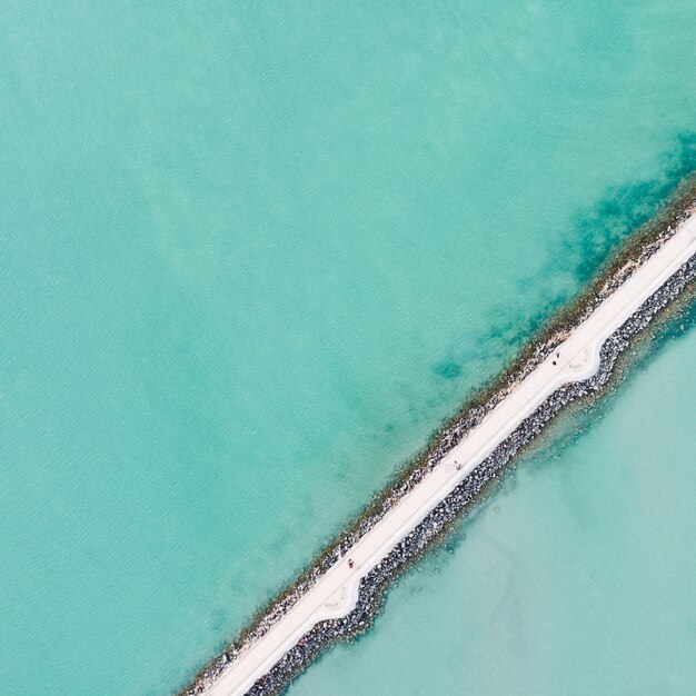 Overhead shot of thin narrow pathways near a shipping dock