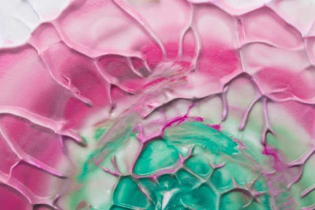 Foto gratuita vista dall'alto di design artistico rosa e verde con texture artistica