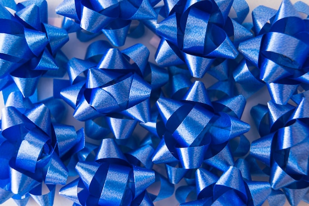 Overhead view of blue satin ribbon decoration