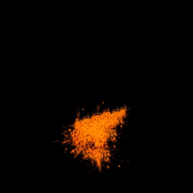 Overhead view of dry orange holi color