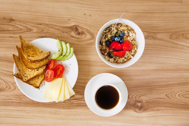 Overhead view of healthy breakfast composition with coffee
