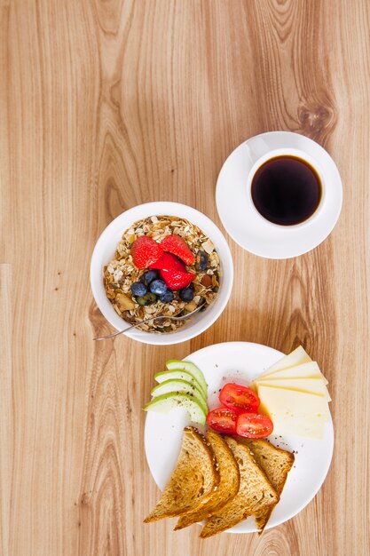 Overhead view of healthy breakfast composition with coffee