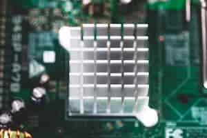 Free photo overhead view of heatsink in motherboard circuit