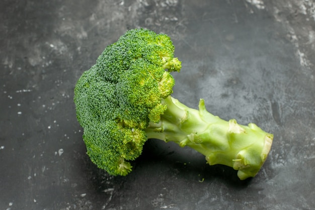 Overhead view of tasty and healthy fresh broccoli on gray table