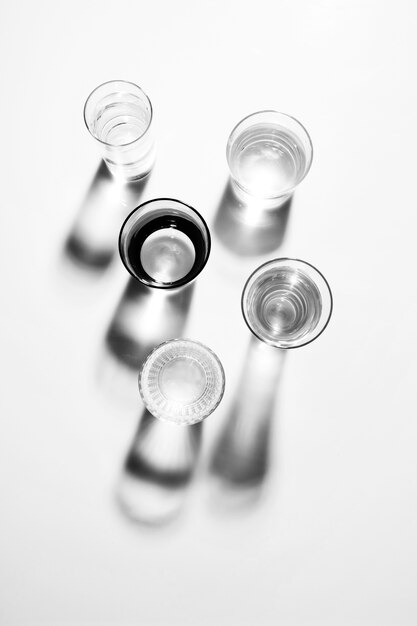 An overhead view of transparent glasses isolated on white background