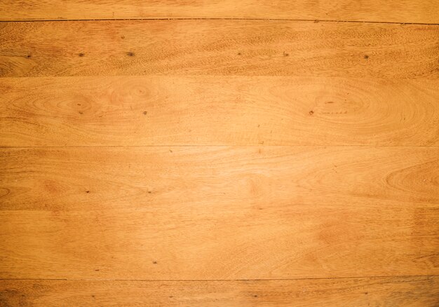 An overhead view of wooden desk