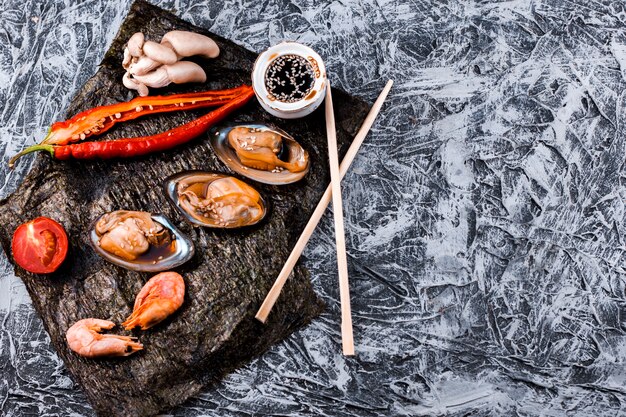 Oysters and shrimps plate with copy space