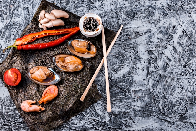 Oysters and shrimps plate with copy space