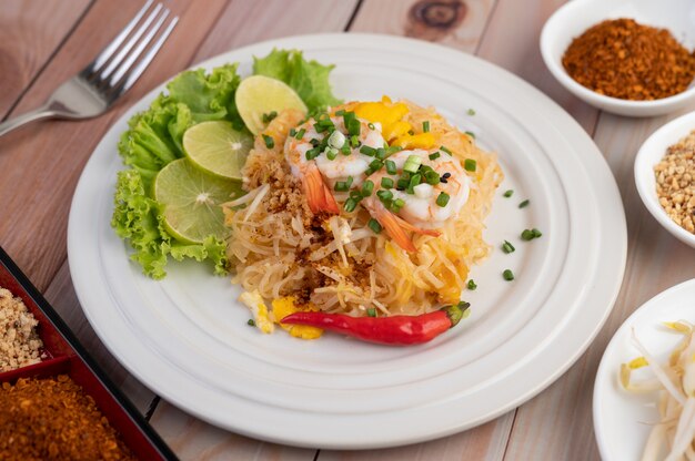 Pad Thai fresh shrimp in a white plate.