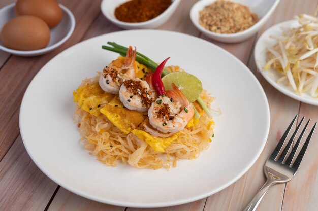 Pad Thai fresh shrimp in a white plate.