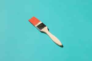 Free photo paint brush on blue background