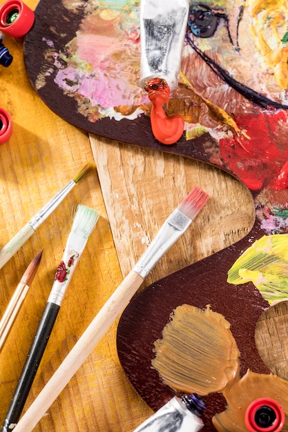 Paint brushes with palette and paint tube