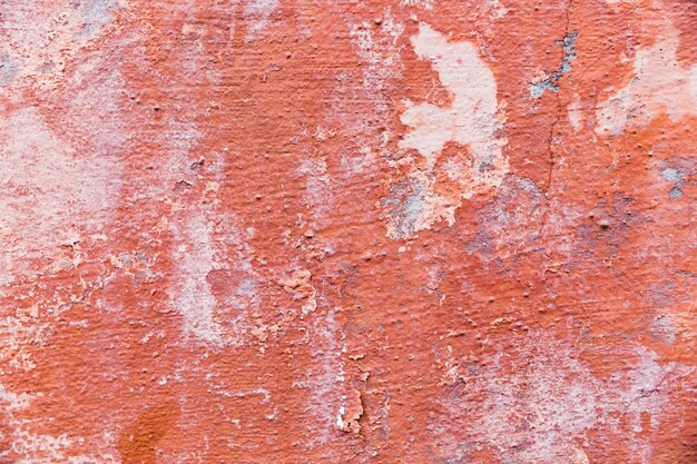 Paint on coarse concrete wall surface