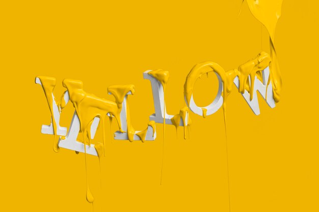 Paint dripping on floating word yellow