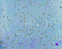 Free photo painted blue water with small star spangles