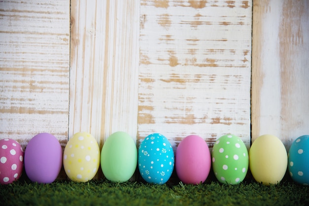 Free photo painted colorful easter eggs background - easter holiday celebration background concept