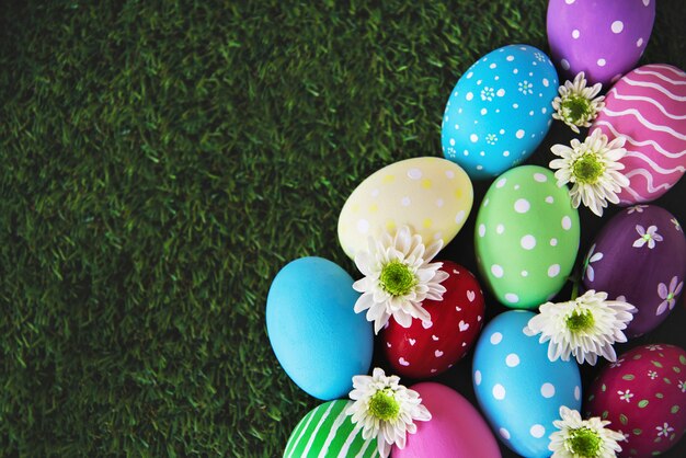 painted colorful easter eggs background - easter holiday celebration background concept