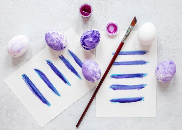 Painted eggs with pastel violet colors for easter