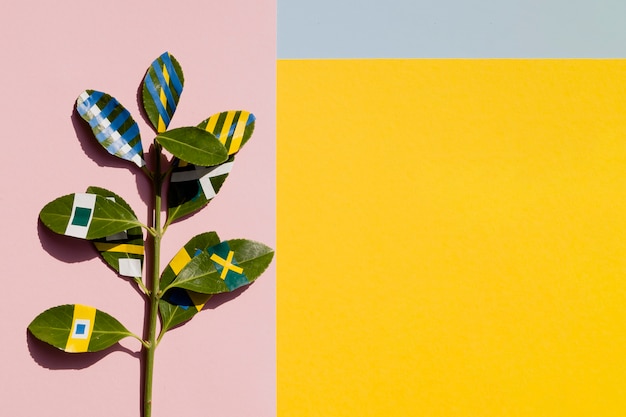 Painted ficus with yellow copy space background